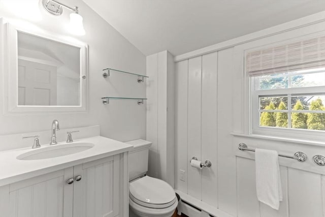 751 Crowell Rd, Chatham, MA 02650 - bathroom with toilet, vanity, and lofted ceiling