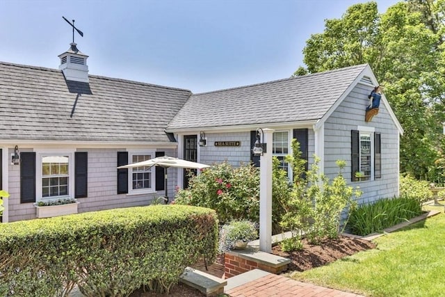 751 Crowell Rd, Chatham, MA 02650 - view of front of home featuring roof with shingles
