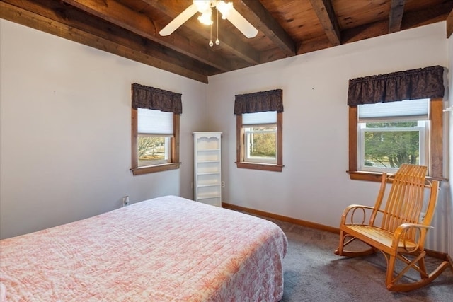 bedroom featuring multiple windows, ceiling fan, and wooden ceiling