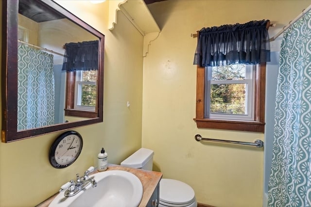 bathroom with sink and toilet