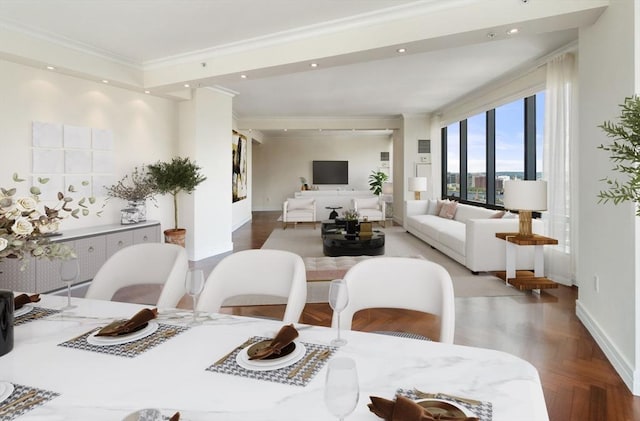 dining area featuring recessed lighting, crown molding, and baseboards