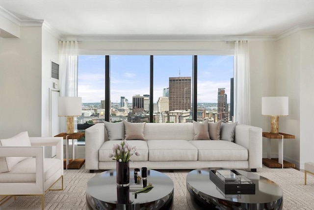 living area with a wealth of natural light, a city view, visible vents, and ornamental molding