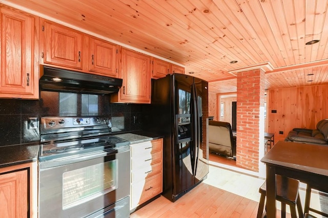 kitchen with tasteful backsplash, range hood, light hardwood / wood-style floors, black appliances, and wood ceiling