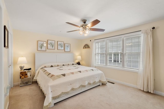 905 Village Ln Unit 905, Bellingham, MA 02019 - bedroom with light colored carpet and a ceiling fan