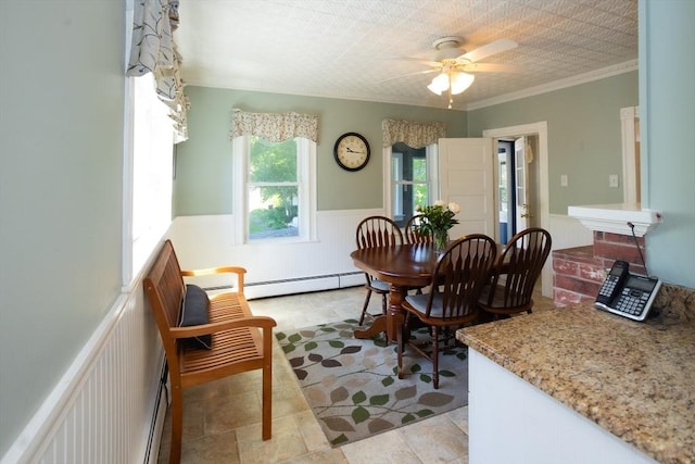 5 Clement Ave, Peabody, MA 01960 - dining room with a wainscoted wall, ceiling fan, baseboard heating, and crown molding