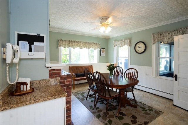 5 Clement Ave, Peabody, MA 01960 - dining area with a baseboard radiator, crown molding, a wainscoted wall, and ceiling fan