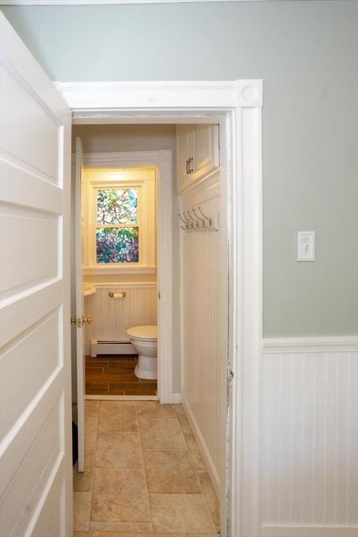 5 Clement Ave, Peabody, MA 01960 - bathroom with toilet and a baseboard radiator