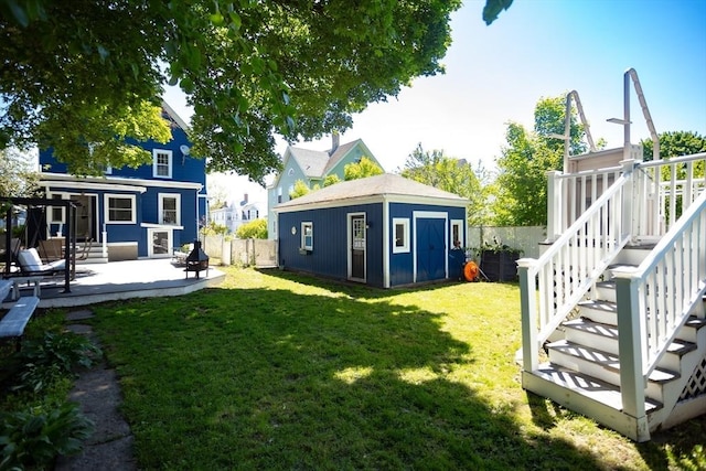 5 Clement Ave, Peabody, MA 01960 - view of yard featuring an outbuilding, a patio, and stairway
