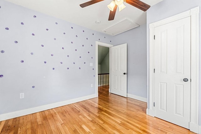 24 Willard St, Malden, MA 02148 - unfurnished bedroom featuring attic access, light wood-type flooring, and a ceiling fan