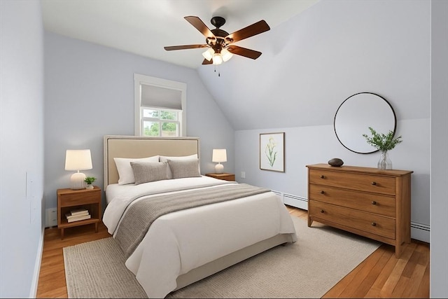 24 Willard St, Malden, MA 02148 - bedroom featuring a baseboard heating unit, light wood-type flooring, lofted ceiling, and ceiling fan