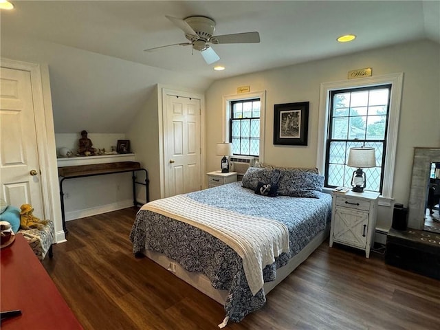 bedroom with lofted ceiling, dark wood-style flooring, cooling unit, and ceiling fan