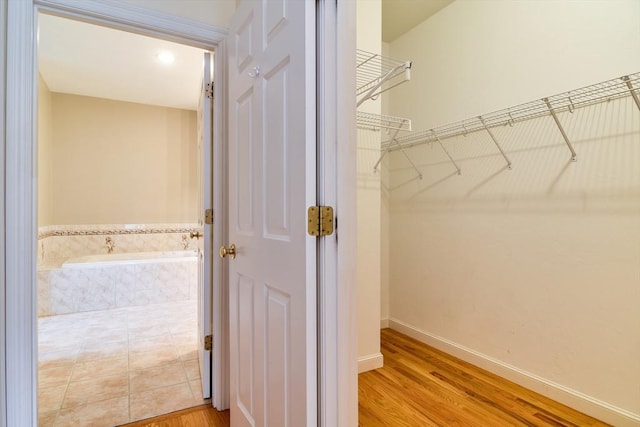 12 Braeburn Ln Unit 12, Ashland, MA 01721 - spacious closet featuring light wood finished floors