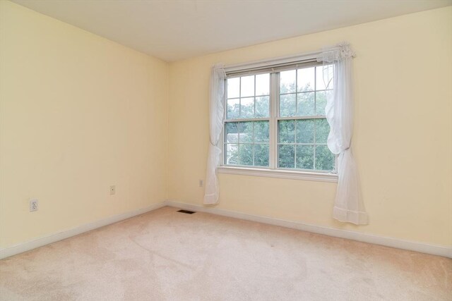 12 Braeburn Ln Unit 12, Ashland, MA 01721 - carpeted empty room with baseboards
