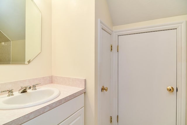 12 Braeburn Ln Unit 12, Ashland, MA 01721 - bathroom with vanity and vaulted ceiling