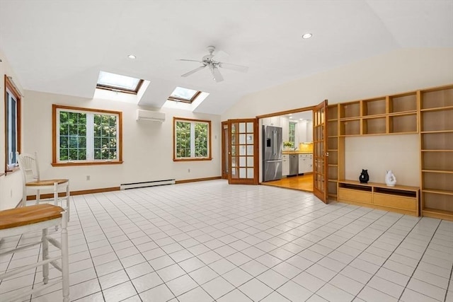 8 Warren Rd, Marblehead, MA 01945 - unfurnished living room with a baseboard heating unit, vaulted ceiling, a wall mounted air conditioner, a skylight, and baseboards