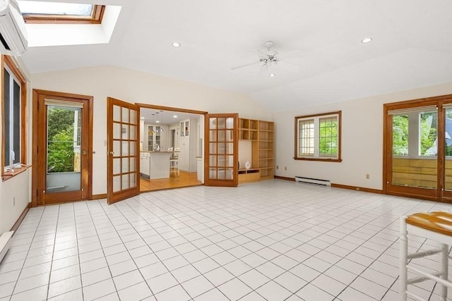 8 Warren Rd, Marblehead, MA 01945 - unfurnished living room featuring lofted ceiling, a baseboard heating unit, an AC wall unit, a skylight, and french doors