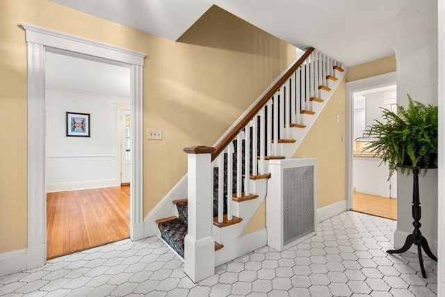 8 Warren Rd, Marblehead, MA 01945 - staircase featuring baseboards