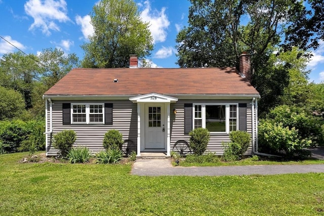 328 N Main St, Sharon, MA 02067 - bungalow-style home with a chimney and a front lawn