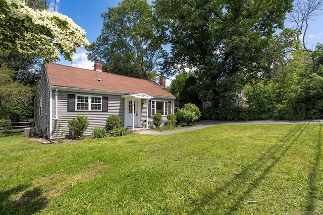 328 N Main St, Sharon, MA 02067 - view of front of house with a chimney