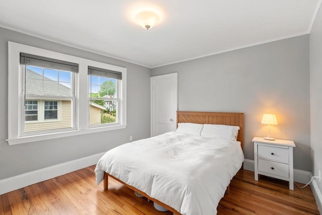 30 Gilbert Rd Unit 30, Belmont, MA 02478 - bedroom with baseboards, crown molding, and wood finished floors