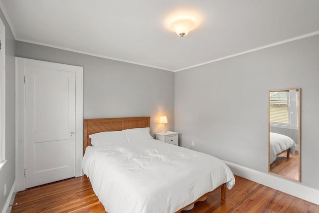 30 Gilbert Rd Unit 30, Belmont, MA 02478 - bedroom featuring wood finished floors, baseboards, and crown molding