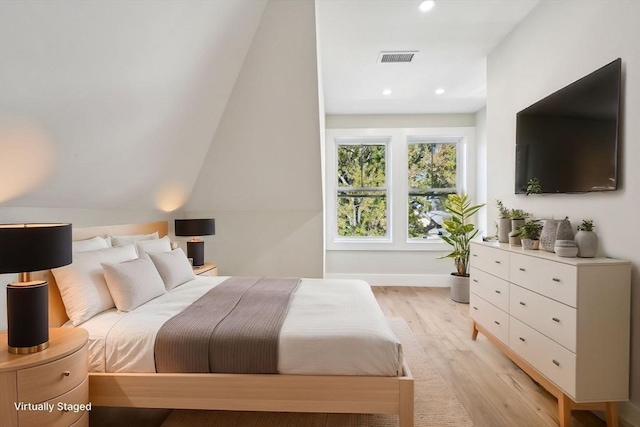 bedroom featuring light wood-type flooring