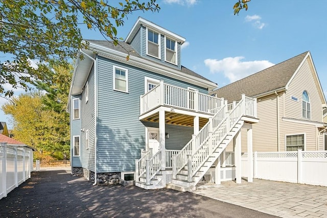 view of front of house with a patio area