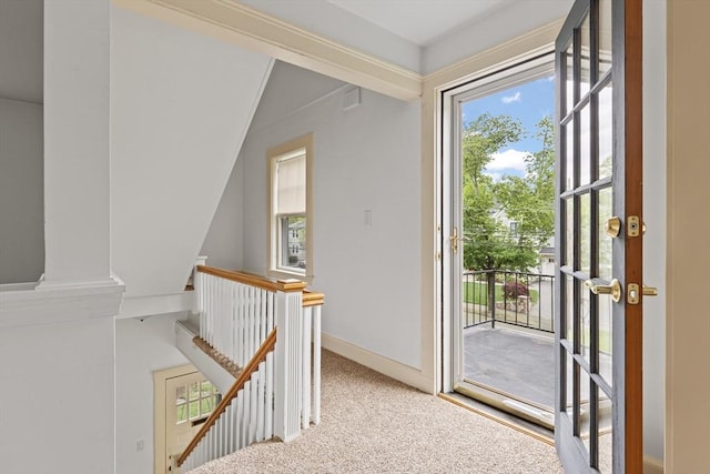 17-19 Maple St, Newton, MA 02466 - carpeted entrance foyer with baseboards