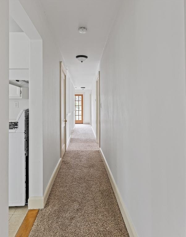 17-19 Maple St, Newton, MA 02466 - corridor featuring light colored carpet and baseboards