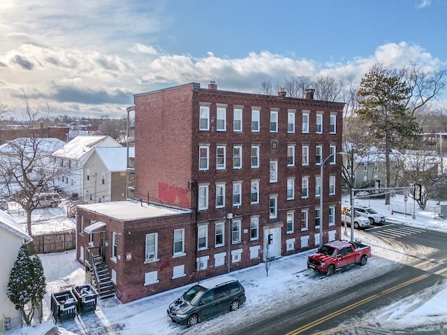 view of snow covered property