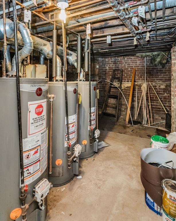 utility room with water heater