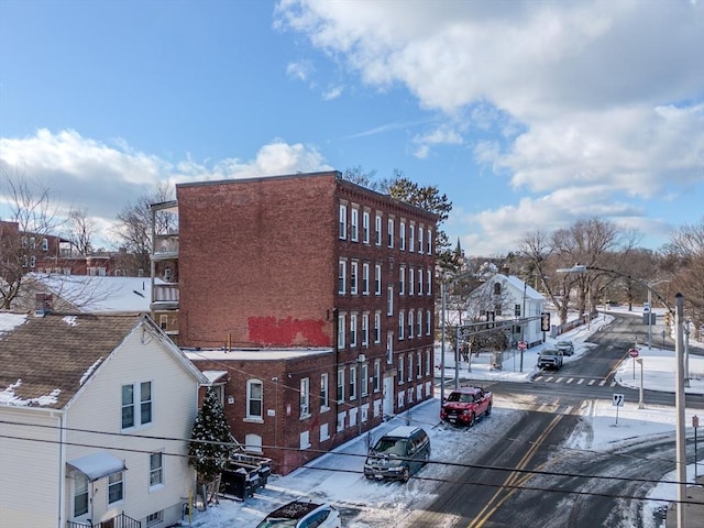 view of snow covered property