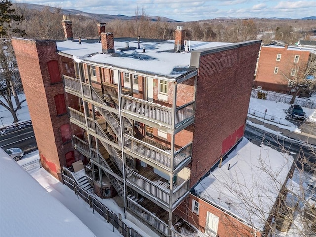 view of snow covered property