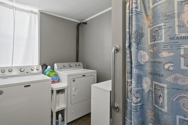 washroom featuring separate washer and dryer