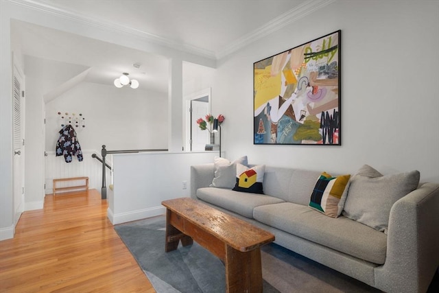 living room featuring crown molding and hardwood / wood-style floors