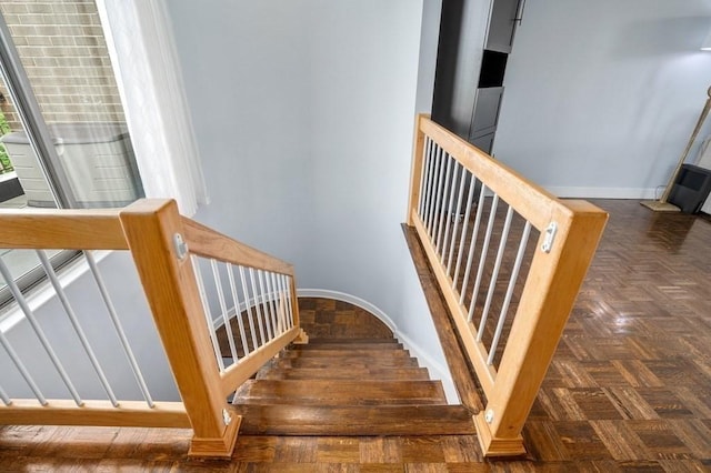 staircase with baseboards