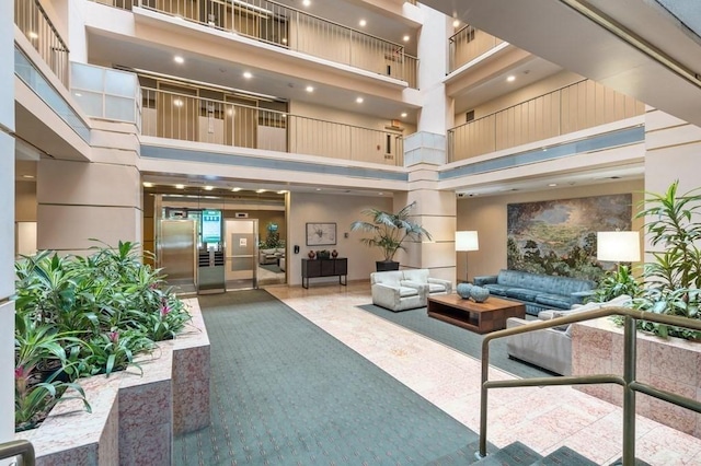 community lobby with a high ceiling