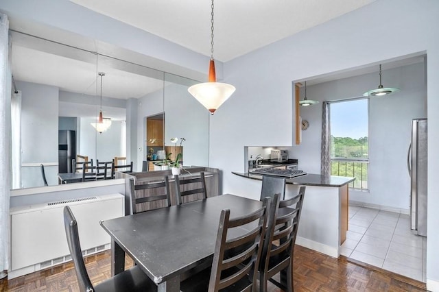 dining room with baseboards