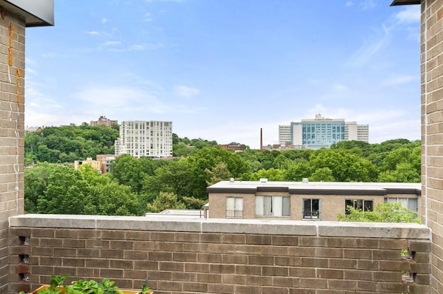 balcony featuring a view of city
