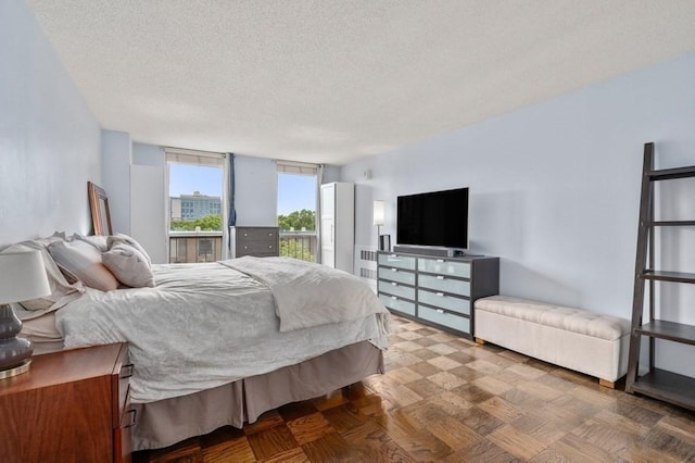 bedroom featuring a textured ceiling