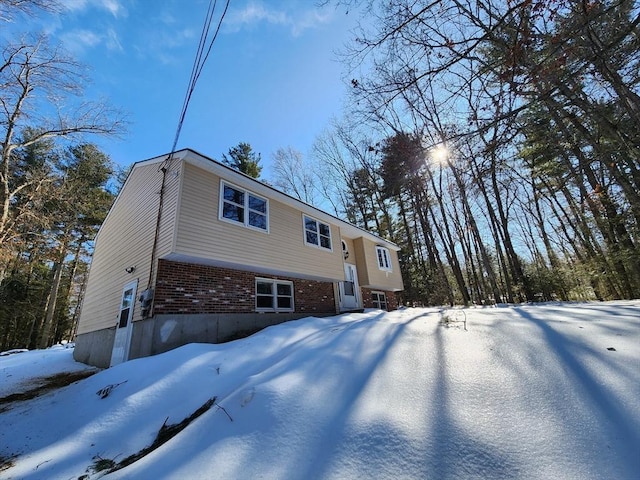 view of front facade featuring brick siding