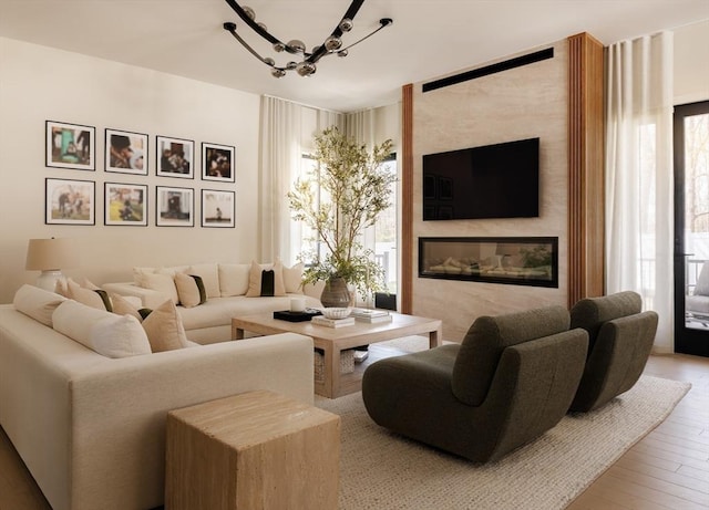 109 Wiswall Rd, Newton, MA 02459 - living room featuring a chandelier and wood finished floors