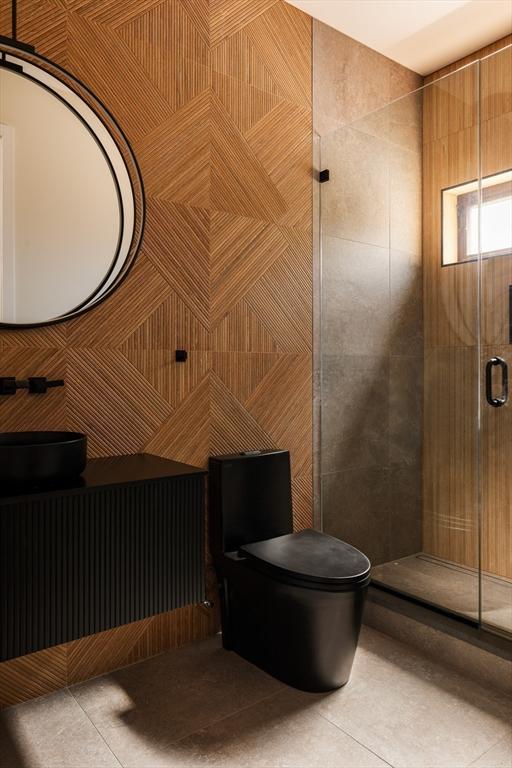 109 Wiswall Rd, Newton, MA 02459 - full bathroom with tile patterned floors, a stall shower, and toilet