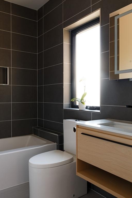109 Wiswall Rd, Newton, MA 02459 - bathroom featuring vanity, toilet, and shower / tub combination