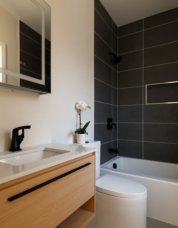 109 Wiswall Rd, Newton, MA 02459 - full bath featuring vanity, shower / bath combination, and toilet