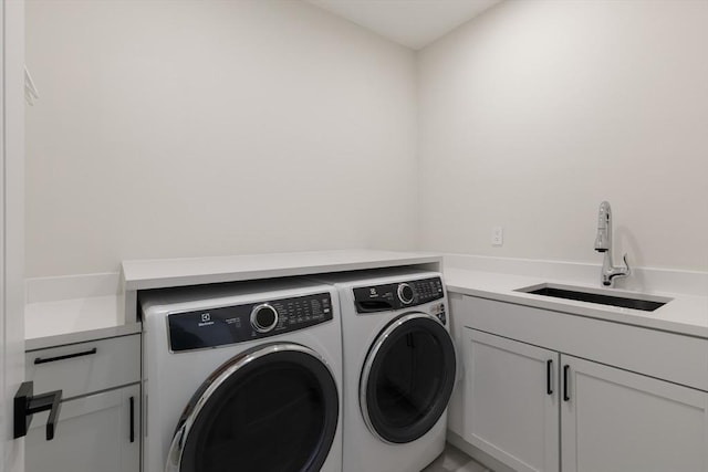 109 Wiswall Rd, Newton, MA 02459 - laundry room with washer and dryer and cabinet space