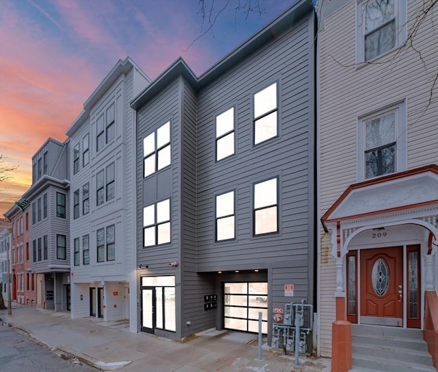 view of property at dusk