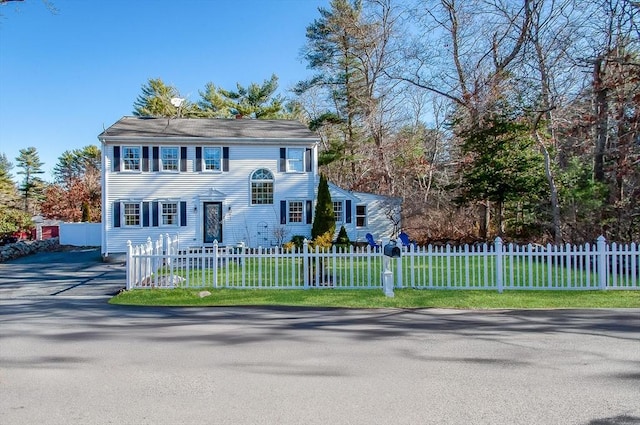 colonial house with a front yard