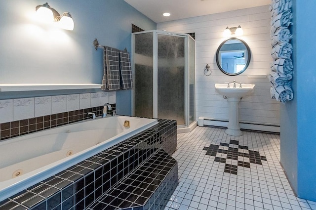 bathroom with plus walk in shower, tile patterned floors, and a baseboard heating unit