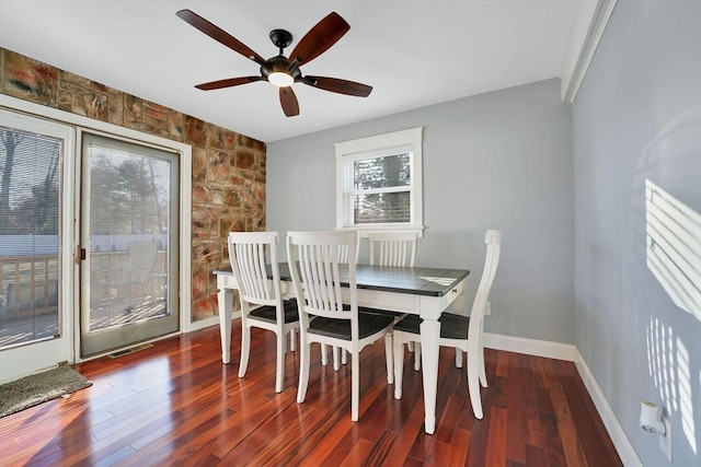 dining area featuring ceiling fan and hardwood / wood-style flooring